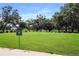 A well-maintained putting green provides a space for recreation at 5008 Sawgrass Lake Cir, Leesburg, FL 34748