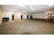 Spacious recreation room with dart boards, a piano, and ceiling fans at 5008 Sawgrass Lake Cir, Leesburg, FL 34748
