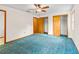 Bedroom featuring ceiling fan and closet space at 512 Galloway Ct, Leesburg, FL 34788