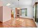 Dining room with hardwood floors, a chandelier, and lots of natural light at 512 Galloway Ct, Leesburg, FL 34788