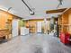 Garage with laundry, hot water tank and storage at 512 Galloway Ct, Leesburg, FL 34788
