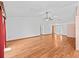 Large living room featuring hardwood floors and high ceilings, great for entertaining at 512 Galloway Ct, Leesburg, FL 34788