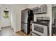 Well-equipped kitchen featuring modern appliances and ample storage space at 520 Dora Ave, Tavares, FL 32778