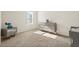 Neutral bedroom with coordinating furniture including a dresser and nightstand, bright window, and light carpet at 5386 Pine Lilly Dr, St Cloud, FL 34771