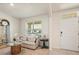 Bright living room with neutral décor, comfortable seating, and lots of natural light at 5386 Pine Lilly Dr, St Cloud, FL 34771