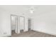 Bedroom featuring wood-look floors and access to storage and closets at 5390 Nw 12Th Pl, Ocala, FL 34482