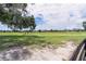 The beautiful view beyond the backyard features walking trails and benches at 5429 County Road 125, Wildwood, FL 34785