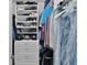 Organized walk-in closet with custom shelving and hanging racks, providing ample storage for clothing and accessories at 5429 County Road 125, Wildwood, FL 34785