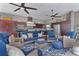 Inviting patio with full kitchen, ceiling fans, and comfortable seating perfect for entertaining or relaxing at 5429 County Road 125, Wildwood, FL 34785
