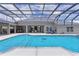 Covered pool and patio area. Perfect spot to relax and entertain any time of the year at 5429 County Road 125, Wildwood, FL 34785
