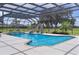 The refreshing enclosed pool area features a slide and waterfall feature for added fun and relaxation at 5429 County Road 125, Wildwood, FL 34785