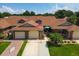 A captivating aerial view showcasing multiple homes and verdant landscaping at 5512 Rosewall Cir, Leesburg, FL 34748