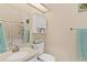 Bathroom featuring a shower with sliding door, neutral walls, and tiled floor at 5512 Rosewall Cir, Leesburg, FL 34748