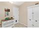 Bright entryway with stylish decor, white cabinets, and tiled floors at 5512 Rosewall Cir, Leesburg, FL 34748