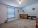 This bedroom features carpeted floors, white walls, and traditional furnishings at 564 Lancaster Ave, Orange City, FL 32763