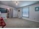 Spacious bedroom with ample natural light, creating a bright and airy atmosphere at 564 Lancaster Ave, Orange City, FL 32763