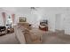 Cozy living room featuring two sofas, a painting on the wall, and a traditional-style lamp at 6556 Piccadilly Ln, Orlando, FL 32835