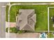 Aerial view of home showing the roof, lush green lawn, and proximity to other homes at 752 Sandy Bar Dr, Winter Garden, FL 34787
