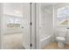 Clean bathroom with shower, tub, and toilet at 752 Sandy Bar Dr, Winter Garden, FL 34787