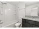 Clean bathroom features a shower and bathtub combo, granite countertop, and modern fixtures at 752 Sandy Bar Dr, Winter Garden, FL 34787