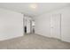 A spacious bedroom with multiple doors leaving into other rooms at 752 Sandy Bar Dr, Winter Garden, FL 34787