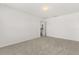 An empty room with neutral carpet. Ready to customize to your liking at 752 Sandy Bar Dr, Winter Garden, FL 34787