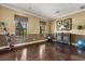 Versatile flex room with hardwood floors, natural light, and ample space for recreation or hobbies at 752 Sandy Bar Dr, Winter Garden, FL 34787