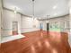 Expansive living area showcases hardwood floors and an open layout at 8045 Waterbury Way, Mount Dora, FL 32757
