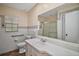 Well-maintained bathroom featuring a tiled shower and countertop sink at 902 Lakeview Dr, Eustis, FL 32726