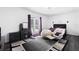 Stylish bedroom featuring private patio access, natural lighting and modern decor at 910 Rangeline Rd, Longwood, FL 32750