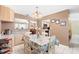 Comfortable dining area with seating for four and natural lighting at 910 Rangeline Rd, Longwood, FL 32750
