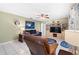 Cozy living room with plush seating and built-in shelving at 910 Rangeline Rd, Longwood, FL 32750