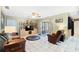 Comfortable living room with tile flooring and a ceiling fan at 910 Rangeline Rd, Longwood, FL 32750