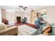 Inviting living room boasts carpeted floors and natural lighting at 910 Rangeline Rd, Longwood, FL 32750