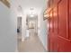 Inviting entryway featuring tile flooring, soft lighting, and a warm, welcoming atmosphere at 9785 Pepper Tree Trl, Wildwood, FL 34785
