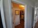 Spacious walk-in closet with built-in shelving for optimal storage and organization of clothing and accessories at 9785 Pepper Tree Trl, Wildwood, FL 34785