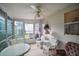 Comfortable lanai featuring a ceiling fan and great natural light at 1007 Diego Ct, The Villages, FL 32159