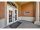 Athletic Club entrance with double doors and prominent signage, inviting a modern and active lifestyle at 109 Falling Acorn Ave, Groveland, FL 34736