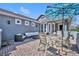 Beautiful outdoor patio space, perfect for dining, lounging, or enjoying sunny days with shade umbrella at 109 Falling Acorn Ave, Groveland, FL 34736