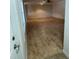 Spacious living room with beautiful flooring, ready for your personal touch at 1105 Hazelnut Dr, Leesburg, FL 34748