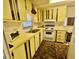 A functional kitchen with ample cabinet space and essential appliances at 112 Caladium St, Leesburg, FL 34748