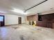 An empty two car garage, providing ample space for parking, storage and projects at 11401 Cypress Dr, Clermont, FL 34711