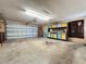 A two car garage providing ample space for parking, storage and projects at 11401 Cypress Dr, Clermont, FL 34711