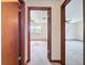 Hallway with view of bedroom at 11401 Cypress Dr, Clermont, FL 34711