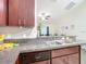 Close up of the kitchen countertops, featuring a stainless steel sink and faucet at 12181 Se 87Th Ct, Belleview, FL 34420