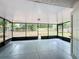 Screened patio features view of the backyard at 12181 Se 87Th Ct, Belleview, FL 34420
