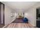 Spacious living room with hardwood floors, natural light and plenty of space at 126 E Beach St, Groveland, FL 34736