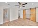 Bright bedroom with adjacent bath and barn door closet, offering a modern aesthetic at 13334 Sw 107Th St, Dunnellon, FL 34432