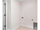 Laundry room with patterned tile flooring and hookups for machines at 13334 Sw 107Th St, Dunnellon, FL 34432