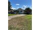 Charming one story home with inviting driveway and landscaping at 1404 Plantation Dr # 9, Lady Lake, FL 32159